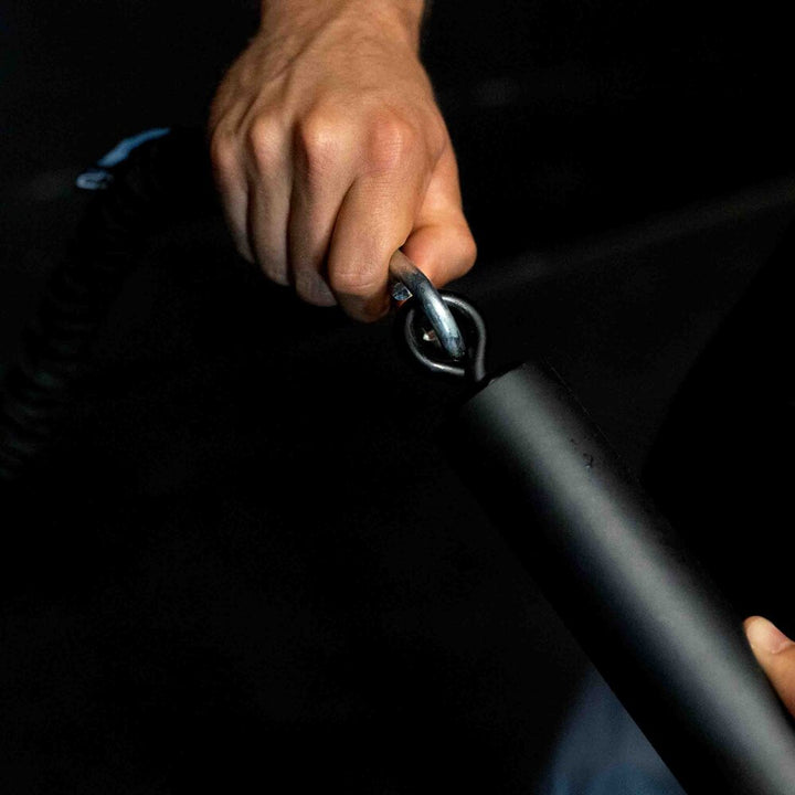 Iron Neck Training Bar with band being clipped on