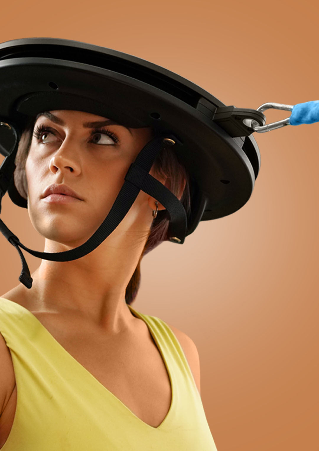 Female training her neck with the Iron Neck 3.0